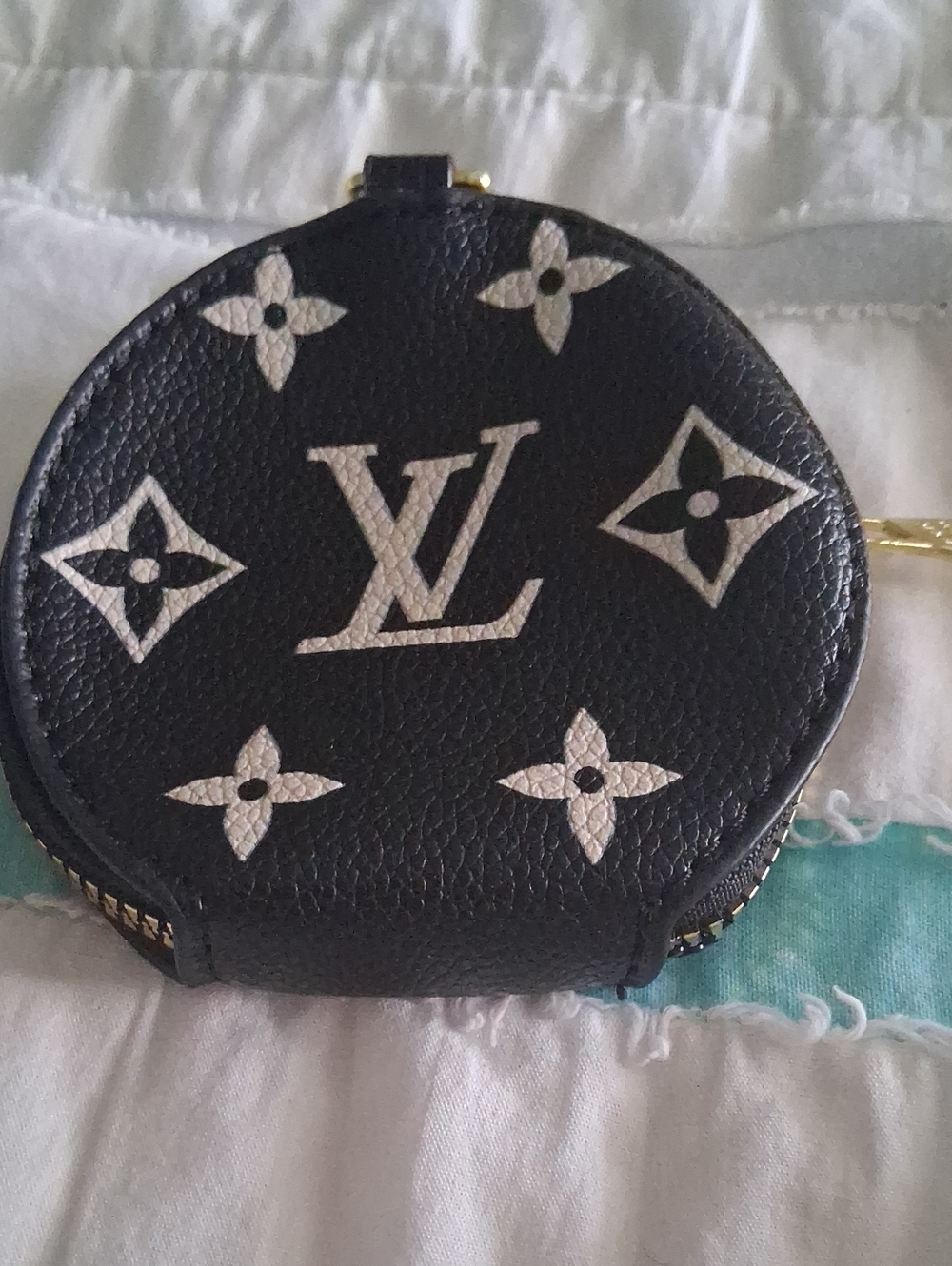 Unknown Source  Black Monogram Round Coin Case